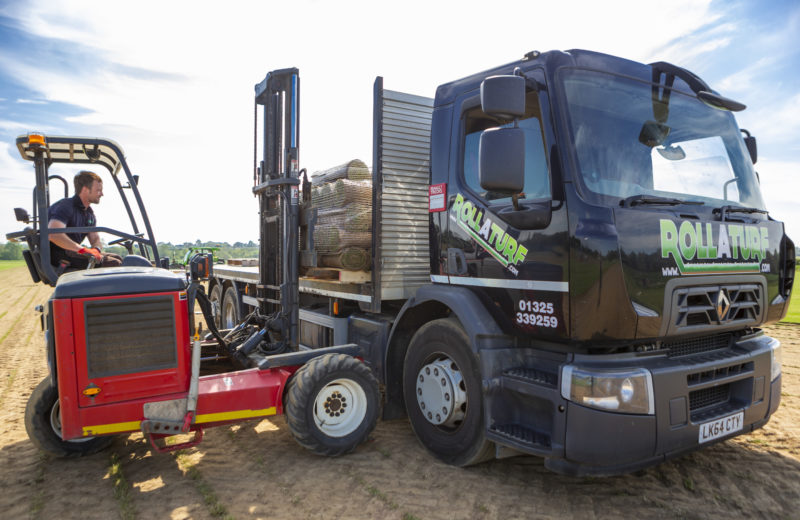 Loading grass turf on to truck